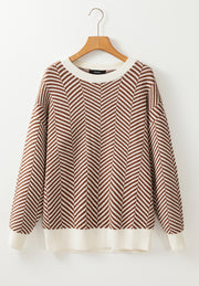 Chevron knit crewneck sweater in camel and white with cream ribbed cuffs and hem.
