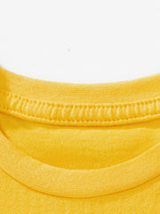 Yellow cotton toddler tee neckline detail with double stitching.