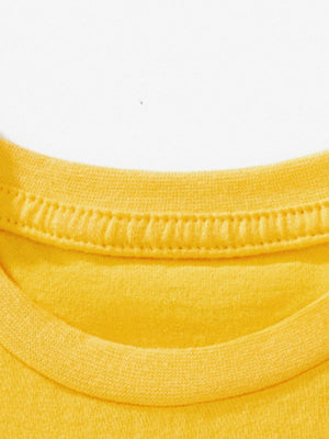 Yellow cotton toddler tee neckline detail with double stitching.