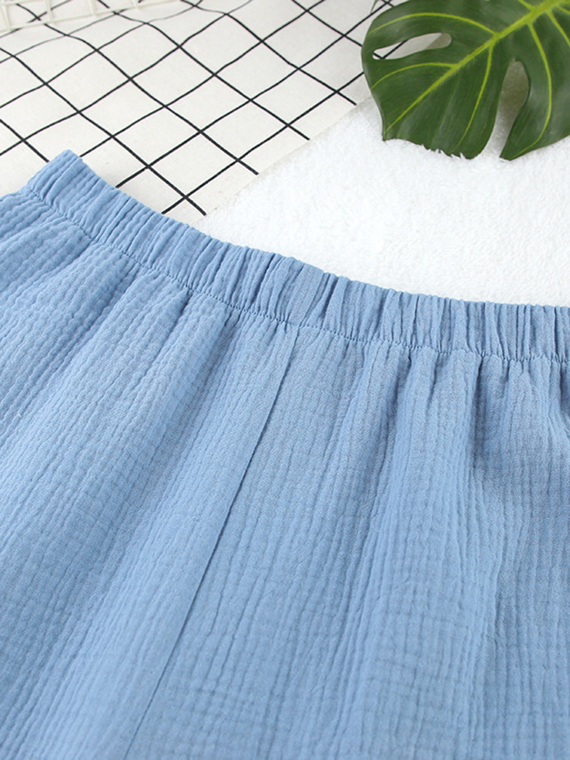Light blue textured cotton bermuda shorts with elastic waistband