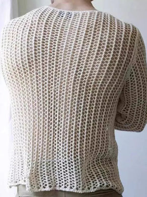 Ivory open-knit crewneck long sleeve sweater with a relaxed fit.