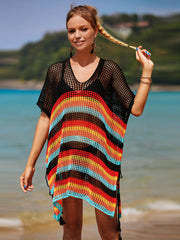 Rainbow stripe crochet beach poncho with black V-neck and short sleeves, featuring tassel ties.