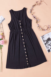 Black button-down mini dress with gathered waistline and sleeveless design.