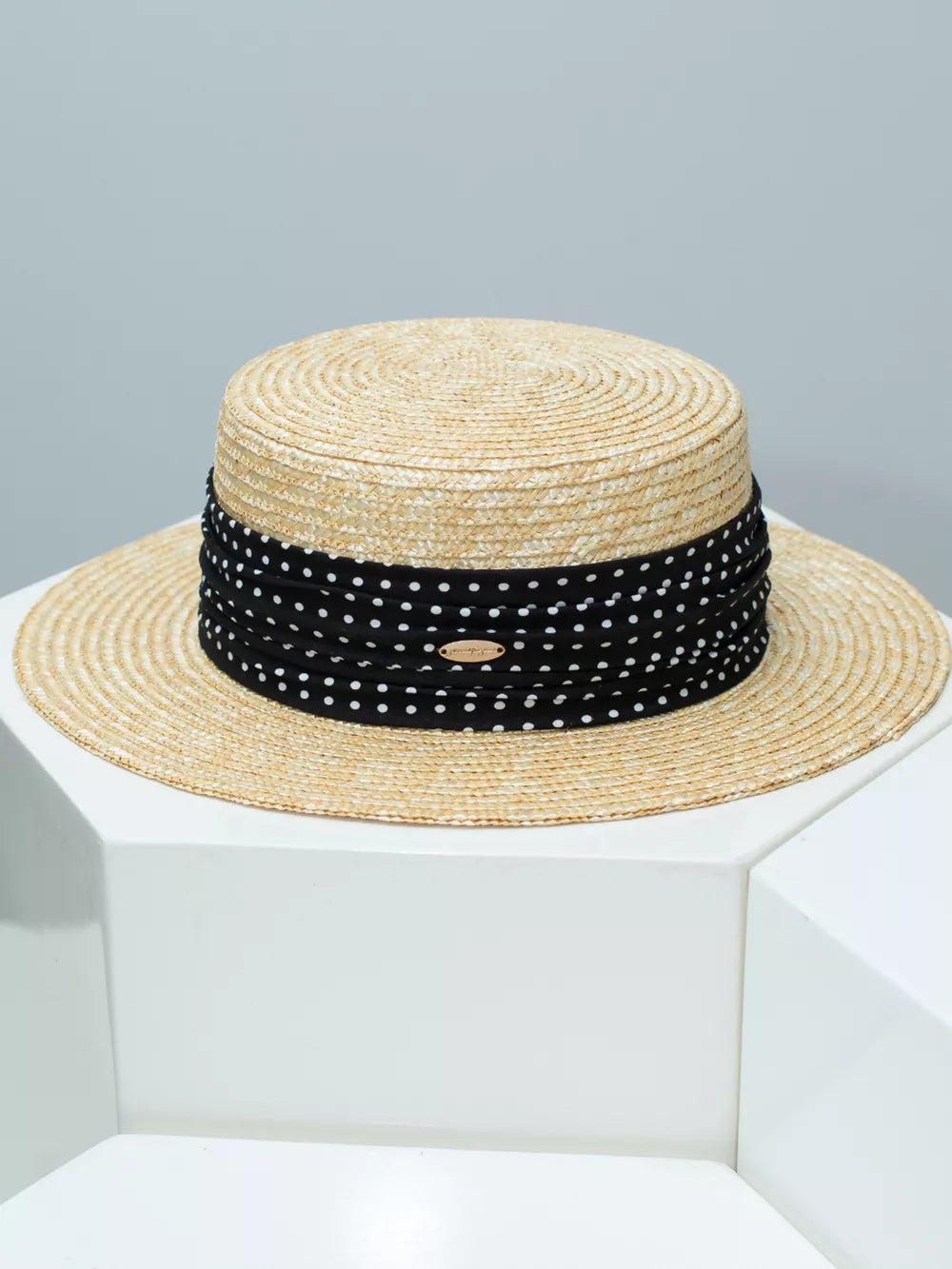 Wheat straw boater hat with ruched black polka dot ribbon band