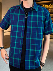 Men's blue and green plaid short sleeve button-down shirt with chest pocket.