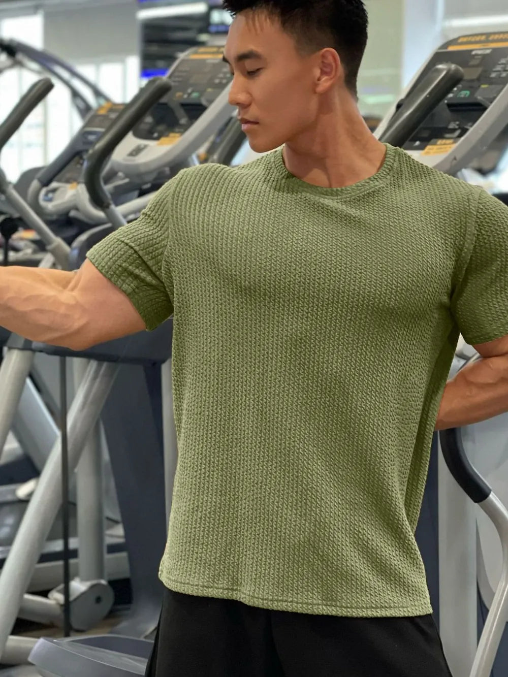 Textured performance crew neck tee in Matcha Green with short sleeves and a waffle knit.