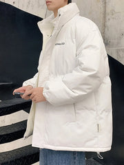 White oversized quilted puffer jacket with a high neck and "ADVANCED" text detail.