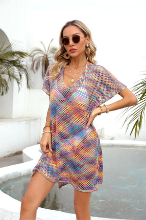 Open-knit caftan cover-up with multicolor stripes and a slit hem.
