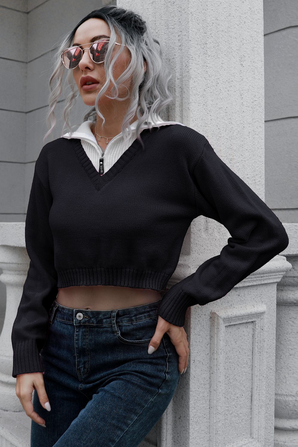 Black cropped acrylic sweater with white collar and zip detail