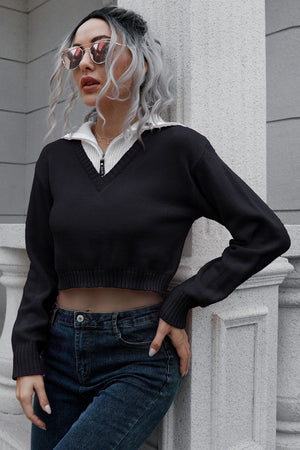 Black cropped acrylic sweater with white collar and zip detail