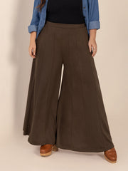 Sculpted flare palazzo trousers in dark brown with vertical seam details.