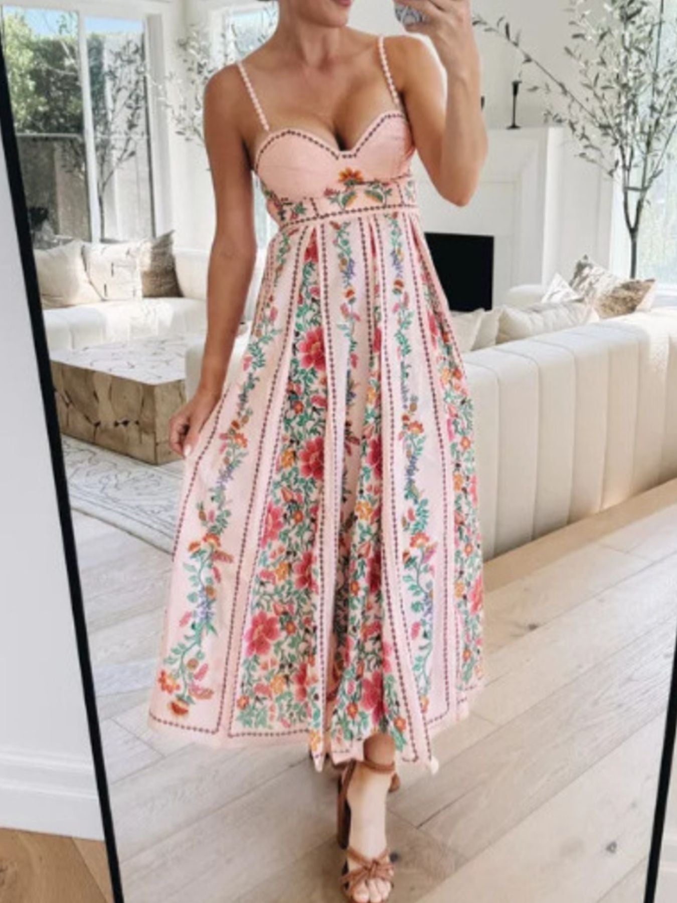 Pink sweetheart neck maxi dress with floral print and vertical stripes