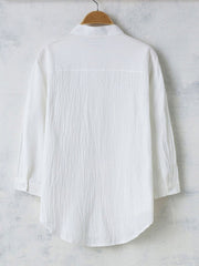 Men's white casual button-up shirt with band collar and textured fabric