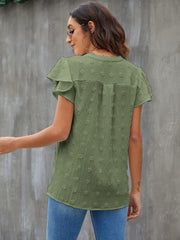 Flutter sleeve Swiss dot blouse in Matcha Green with a relaxed fit.