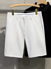 Men's white chino shorts with a button and zip fly, classic fit.