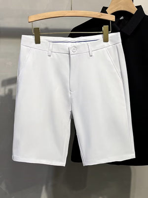 Men's white chino shorts with a button and zip fly, classic fit.