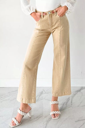 High-waisted cropped wide-leg jeans in tan denim with front seam detail.