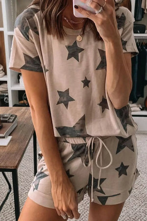 Camo star print pajama set with drawstring shorts and short sleeve top.