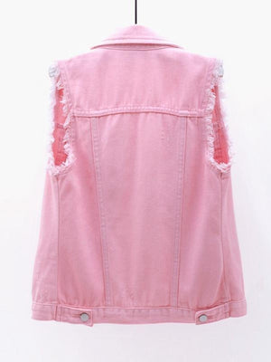Pink denim vest with frayed shoulders and distressed details.