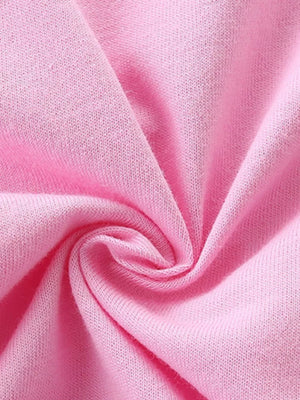 Pink cotton toddler pajama top with ruffled detail