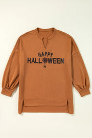 Caramel Halloween graphic slit hem sweatshirt with V-neck and balloon sleeves.