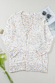 Confetti knit open-front cardigan in ivory with colorful speckles, V-neck, and pockets.