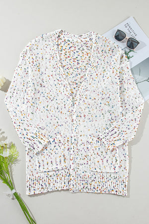 Confetti knit open-front cardigan in ivory with colorful speckles, V-neck, and pockets.