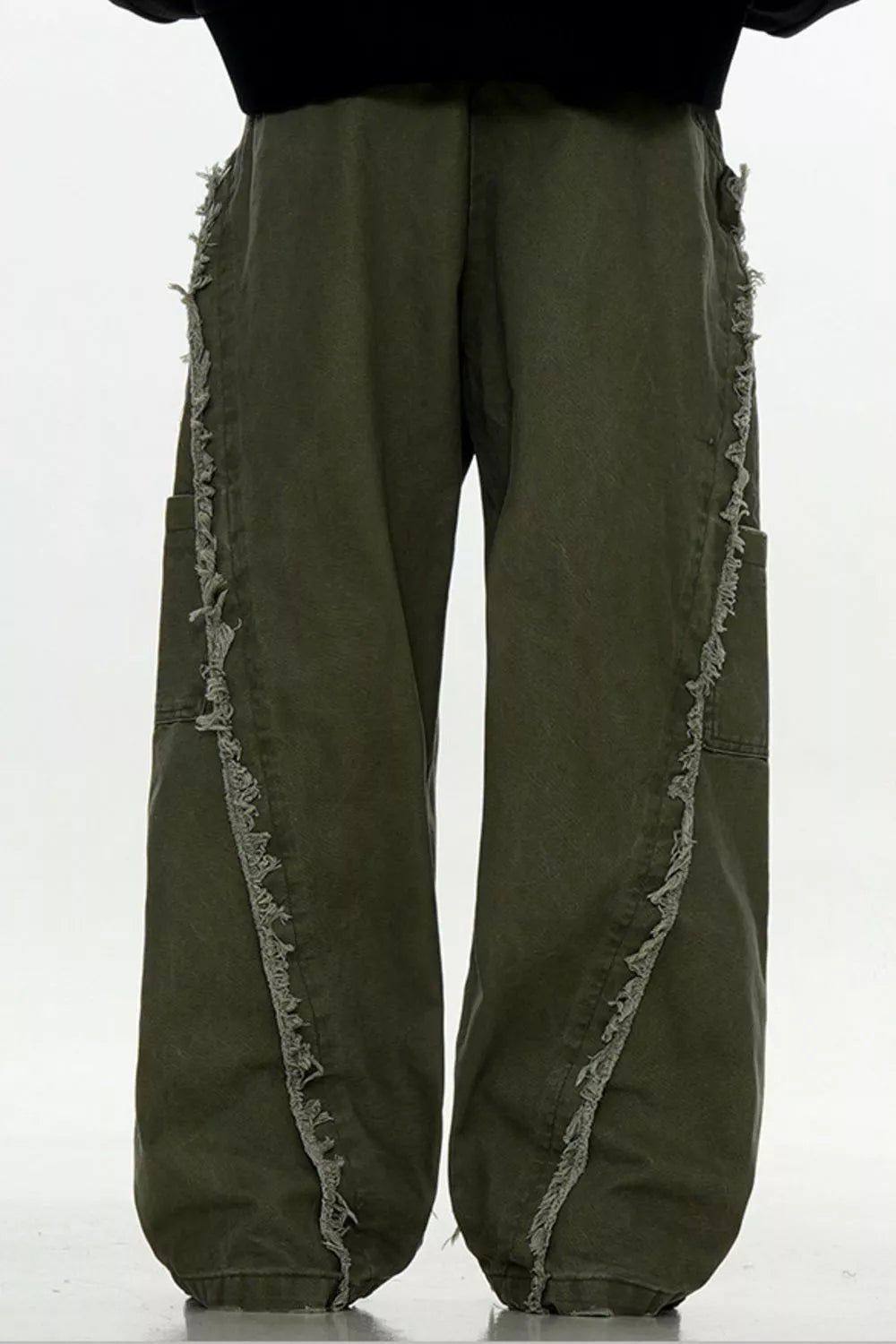 Army green wide-leg sweatpants with distressed fringe detail on side seams.