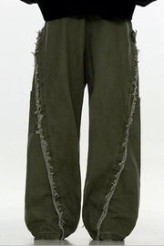 Army green wide-leg sweatpants with distressed fringe detail on side seams.