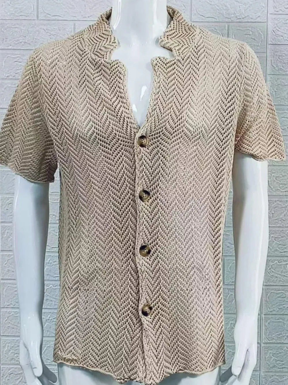 Open-knit herringbone resort shirt in Khaki with button front and short sleeves.