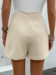 Cream asymmetric wrap skort with buckle detail and back zipper