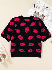 Black short-sleeve knit sweater with a playful pink football pattern.