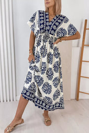 Blue floral print V-neck dolman dress with drawstring waist and ankle length