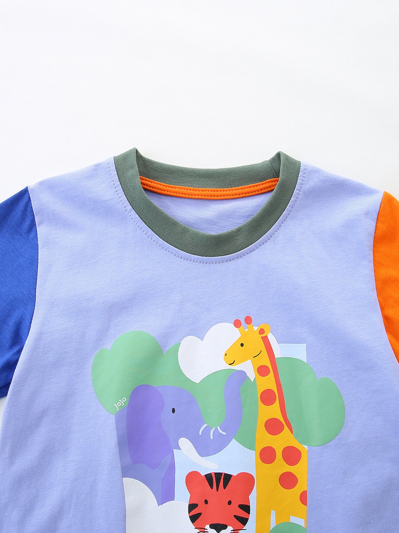 Toddler t-shirt with safari animals print, color block sleeves, and crew neck.