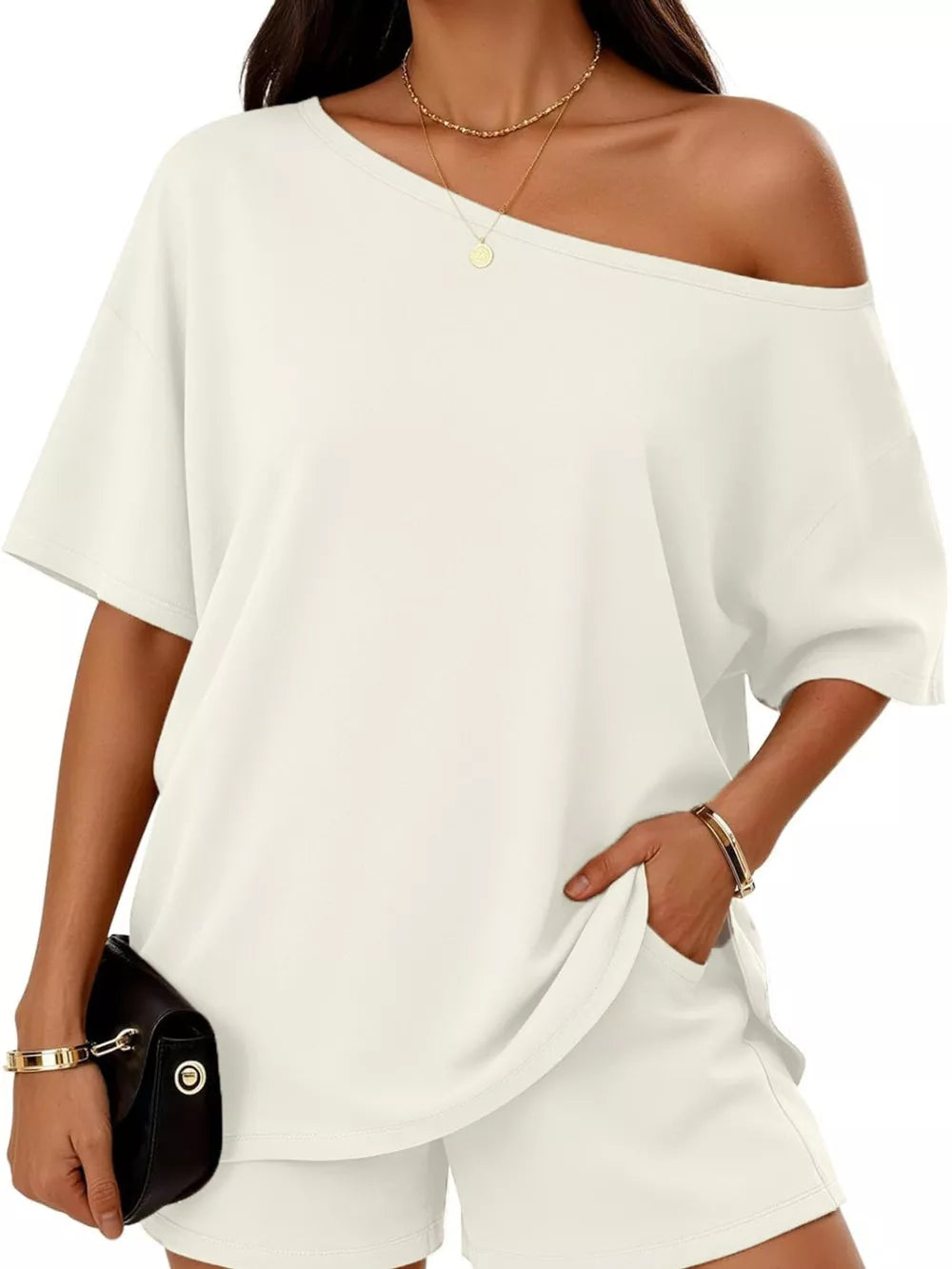 White boat neck tee and shorts set with off-the-shoulder detail.