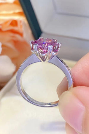 Pink moissanite sterling silver ring with diamond accents