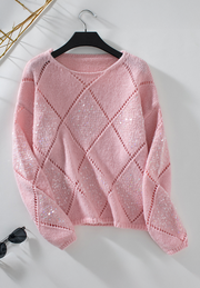 Blush pink knit sweater with diamond cutwork and scattered sequins.