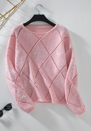 Blush pink knit sweater with diamond cutwork and scattered sequins.