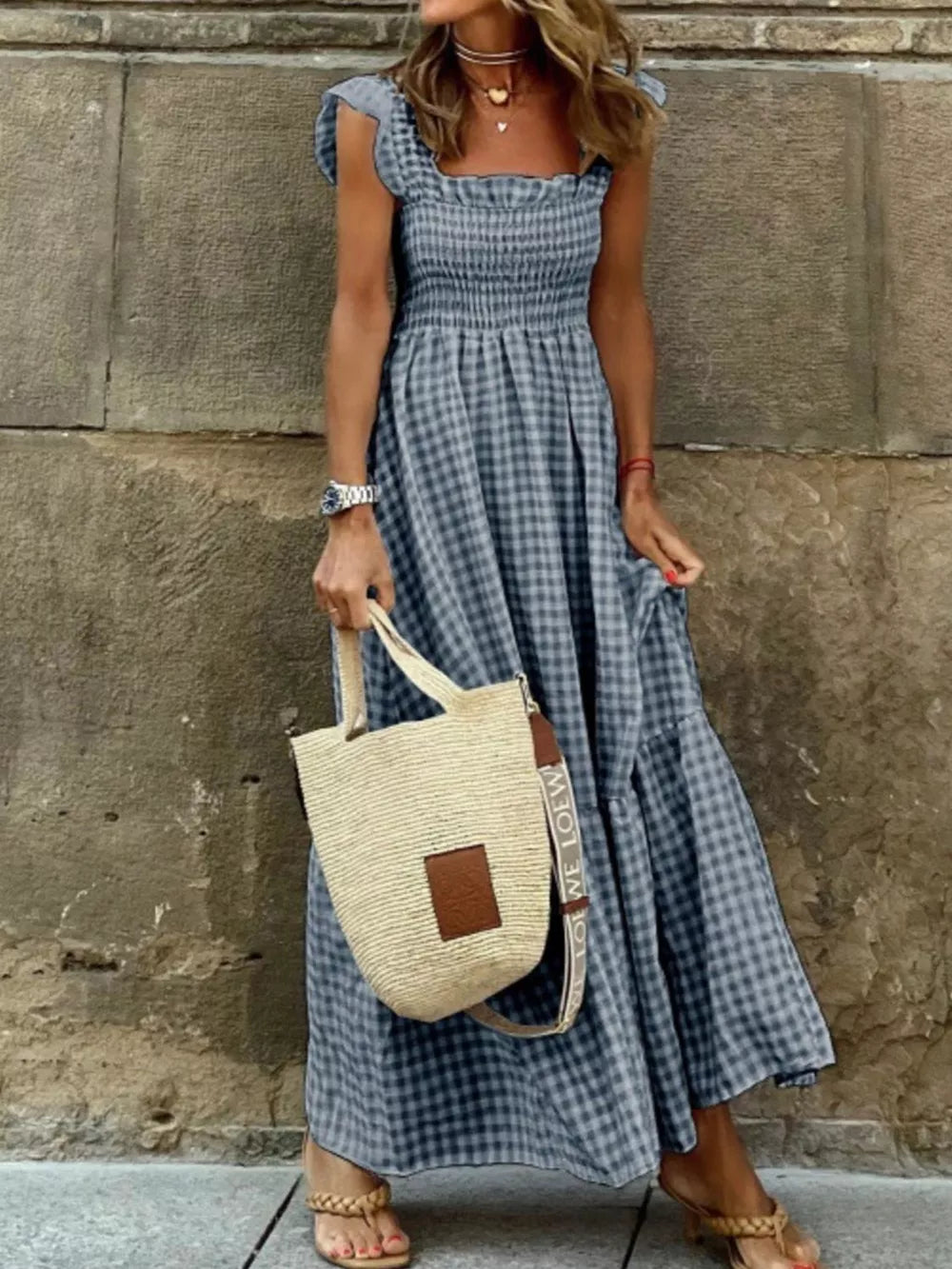 Sky blue gingham ruffled maxi dress with smocked bodice and square neckline.