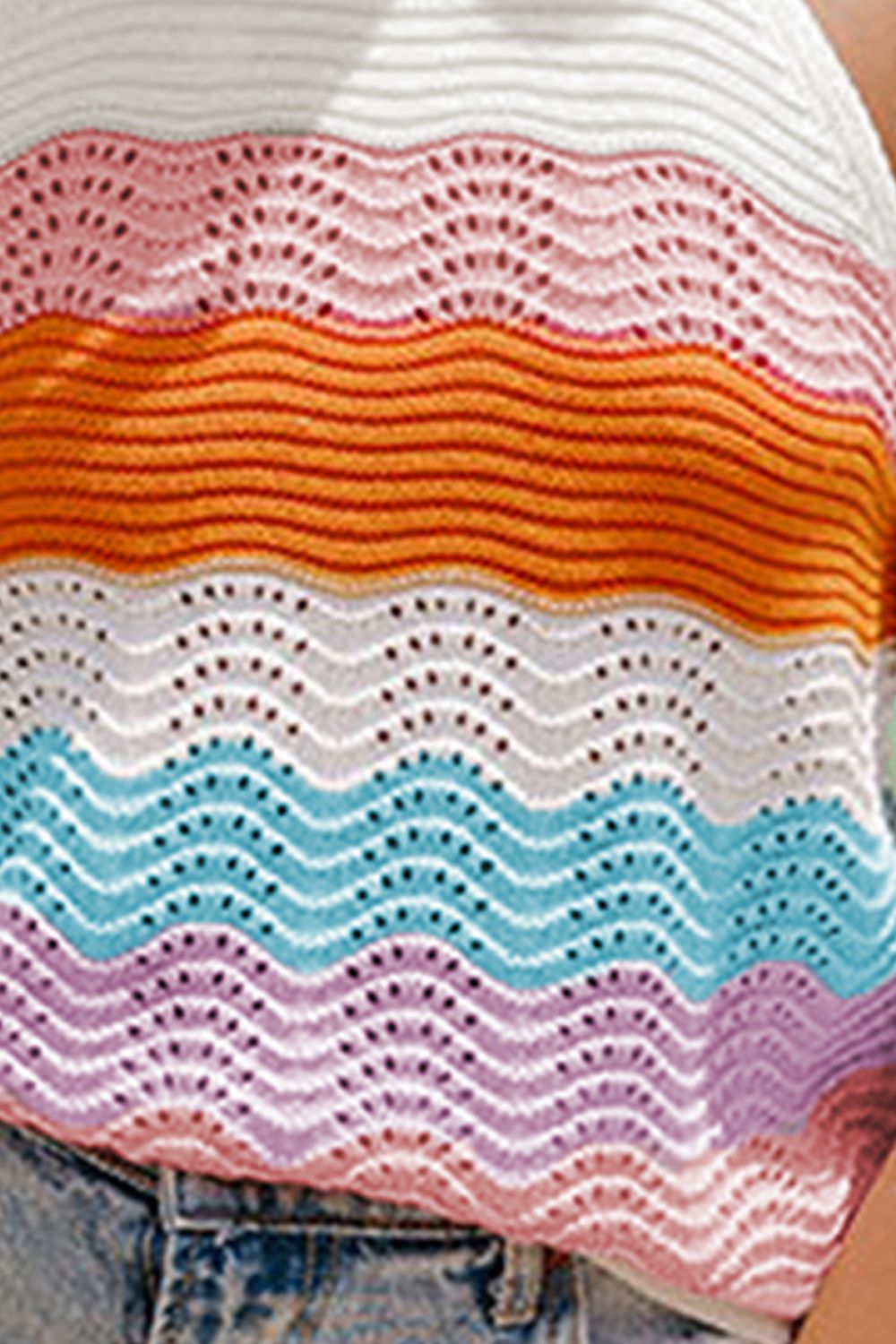 Wavy knit halter top with multicolor chevron stripes and open knit details.
