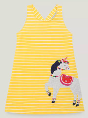 Yellow striped cotton blend toddler dress with a whimsical unicorn applique and criss-cross back.