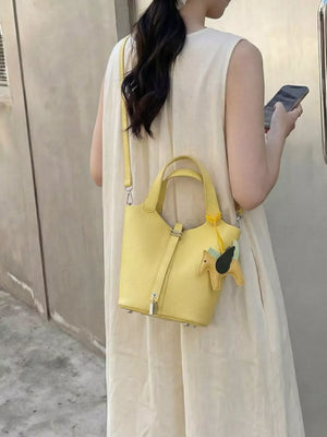 Adjustable Strap Bucket Bag in Gold, close-up detail