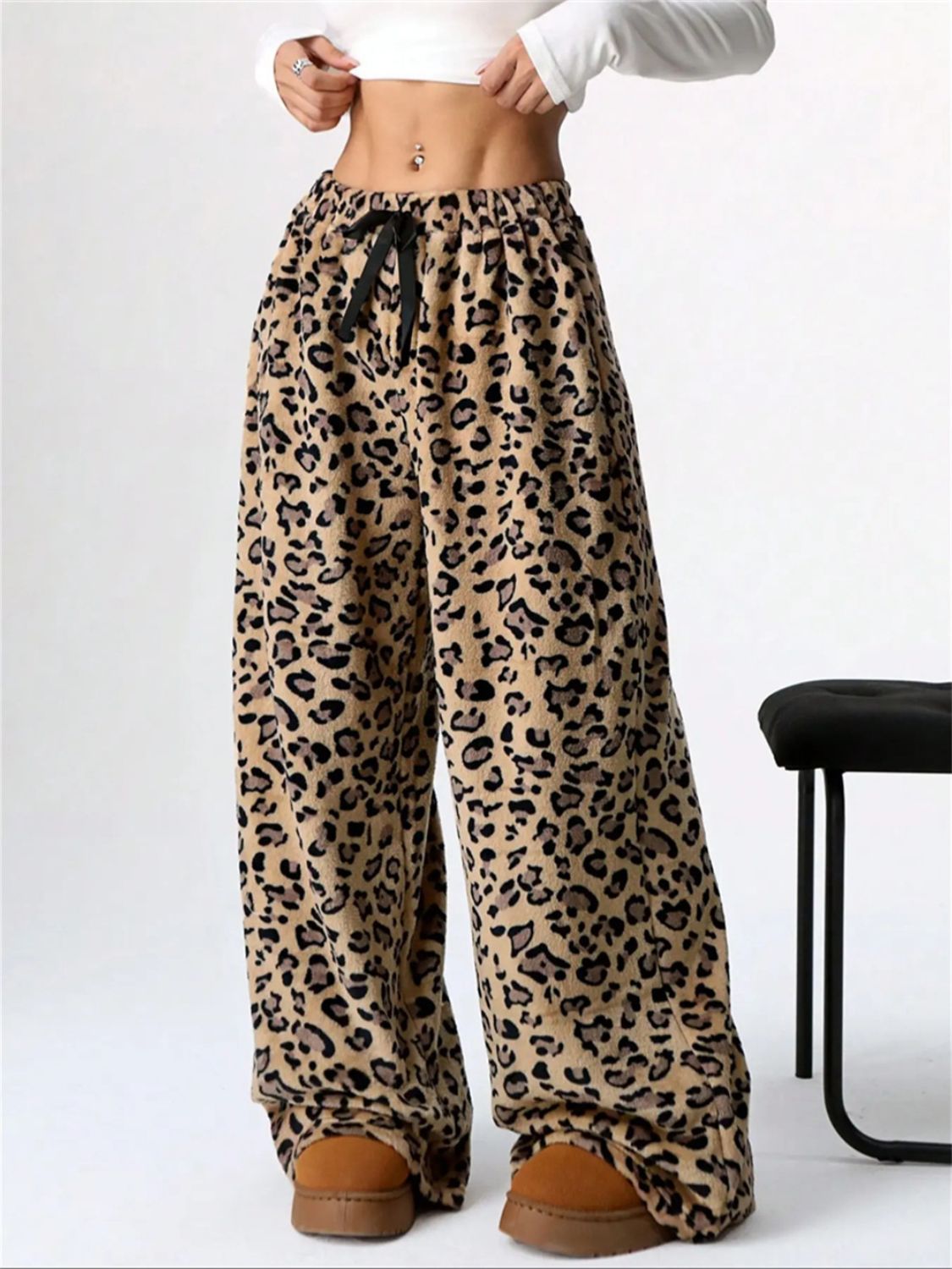 Leopard print lounge palazzo trousers with drawstring waist and wide leg.