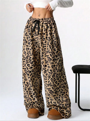 Leopard print lounge palazzo trousers with drawstring waist and wide leg.