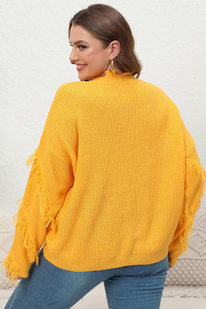 Banana yellow acrylic knit sweater with fringe trim on sleeves.