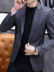 Men's grey slim fit blazer with subtle gold and black grid pattern, single button closure.