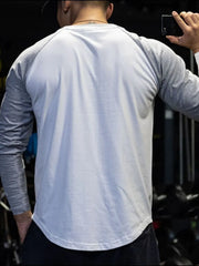 Raglan sleeve t-shirt in gray and white, crew neck, casual basic style.