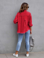 Deep Red distressed denim shacket with frayed hem and cuffs, worn open over light wash jeans.