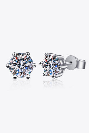 Six-prong solitaire stud earrings in silver with clear cubic zirconia stones.