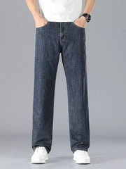 Men's navy straight leg cotton jeans with classic five-pocket styling.